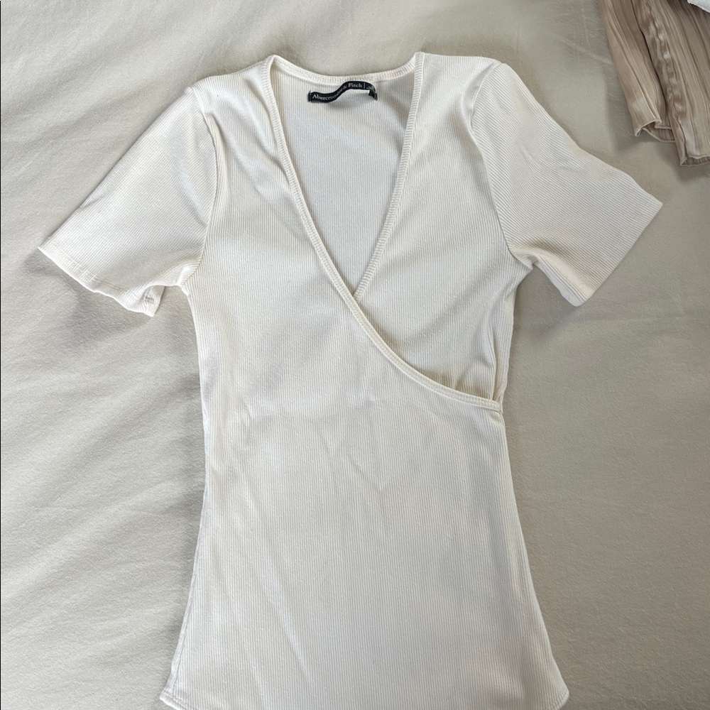 Cream Abercrombie bodysuit